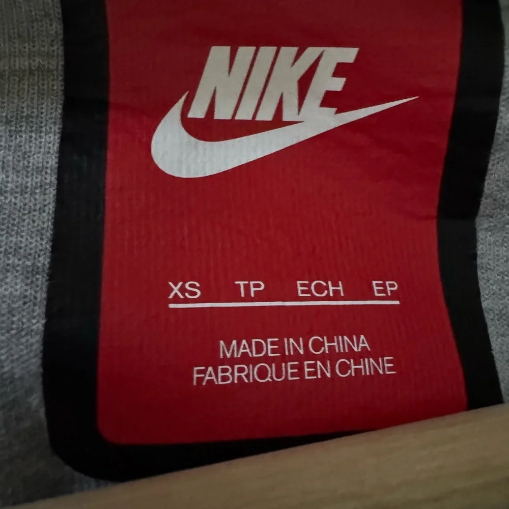 Nike asymmetric cape hoodie
